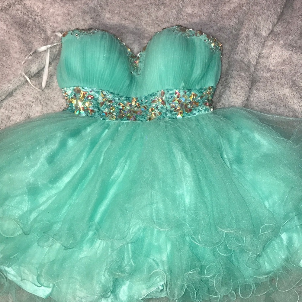 Tiffany Blue short dress, rime stones around